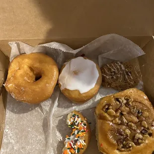 Assorted donuts and a cookie
