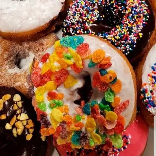 a variety of donuts on a plate