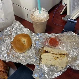 Breakfast burrito, bacon egg and cheese bagel, caramel iced coffee