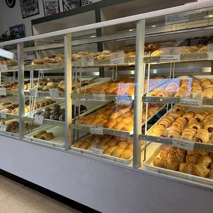 a display case filled with baked goods