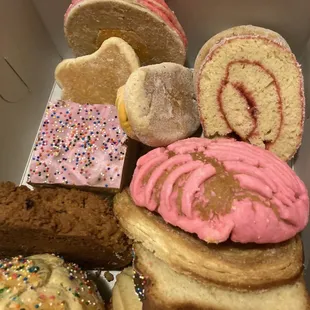 a variety of donuts in a box