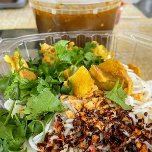 a salad in a plastic container