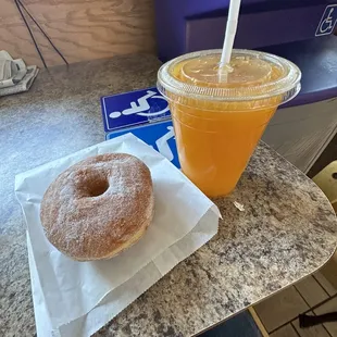 Sugar donut and fresh orange juice, Yum