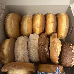 a variety of donuts in a box