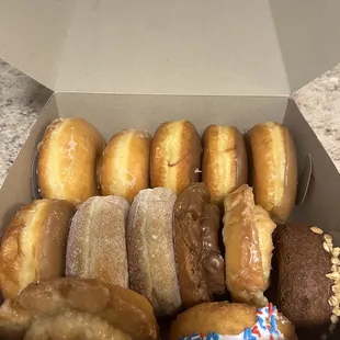 a dozen donuts in a box