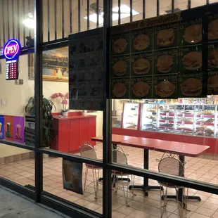 Outside of the Donut Shop at 6 AM. Clean and well lit. Parking available in front.