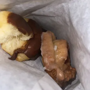 Chocolate twist and a glazed Old Fashion Glazed Donut