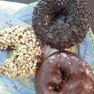 $1.50 each. 3 devils food here -- choc w nuts, choc w sprinkles, and chocolate. Devils food is only served on Fridays from what I can tell