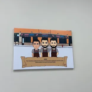 two men in front of a donut shop