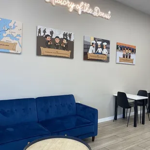 a living room with a blue couch