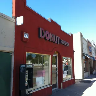 a donut shop on a sunny day