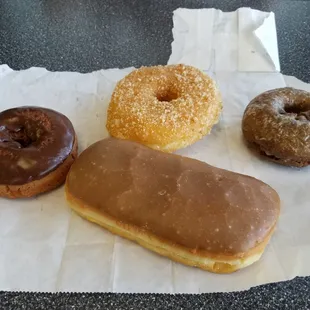 Crumb yeast donut, blueberry cake, chocolate glazed cake, maple long john &amp; cream filled