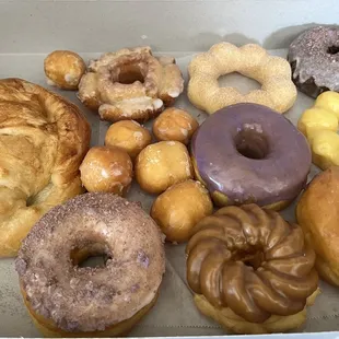 a variety of doughnuts in a box
