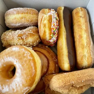 Raised Donuts, Cinnamon Roll, Chocolate and Maple Bars, and Butter Milk Plain Donut
