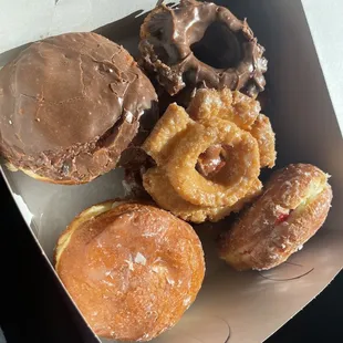 a variety of donuts in a box