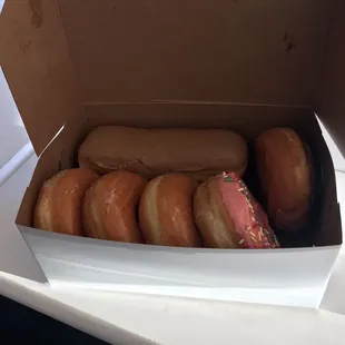 a dozen donuts in a box