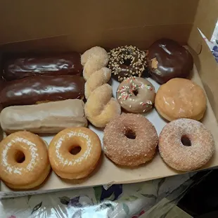 a variety of doughnuts in a box