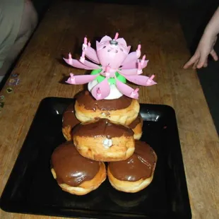 Mint cream filled chocolate glazed donuts for a donut cake for my birthday