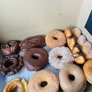 Mixed dozen donuts for sons birthday