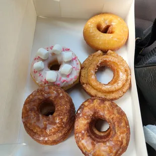 a variety of donuts in a box