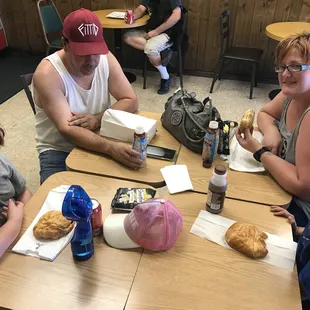 a group of people sitting around a table