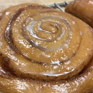 cinnamon rolls on a cooling rack