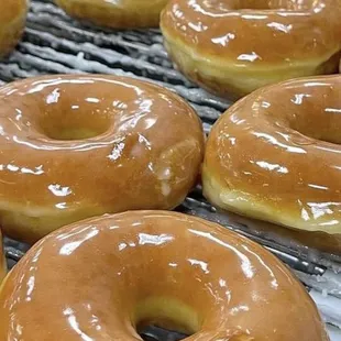 glazed donuts on a cooling rack