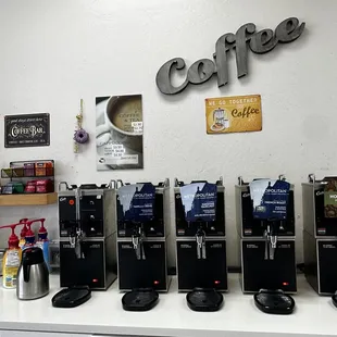 a row of coffee machines