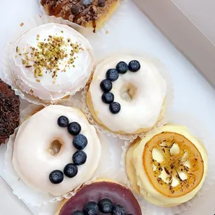 a variety of donuts in a box