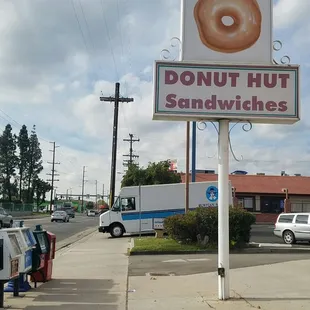 a sign for a donut shop