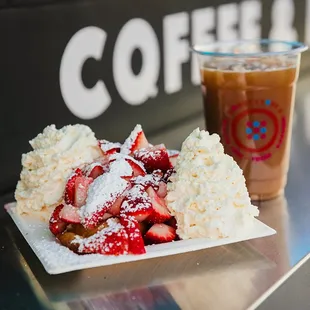 Strawberries and Cream - Fresh sliced strawberries, organic strawberry preserves, freshly made vanilla whipped cream, powdered cane sugar.