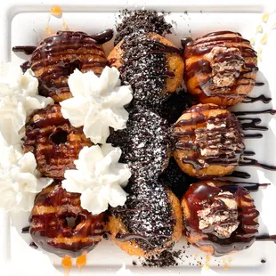 The Chocolate Trifecta: an order each of our delicious chocolate donuts- Chocolate Covered Salty, Ore-uh-oh and Are You Snickering.