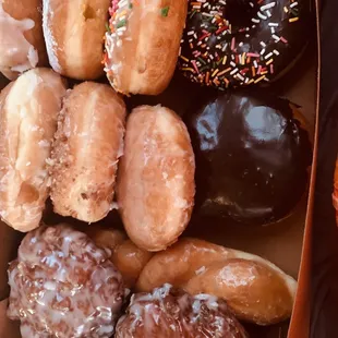 a variety of donuts in a box