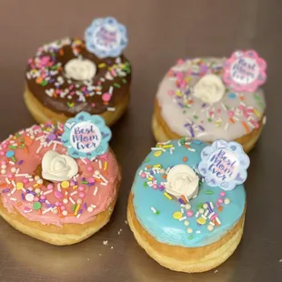 three different flavored donuts