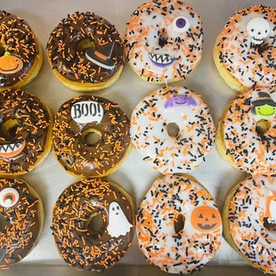 a variety of sprinkled donuts