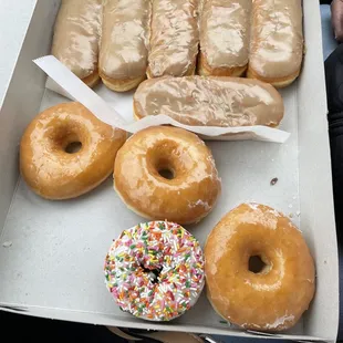 Maple bars, glazed, and Sprinkles! Ate the French Twist and lemon filled!