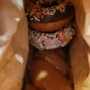 a variety of donuts in a bag