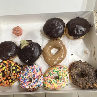 One bite of the two cherry donuts, sorry that&apos;s all that was left. Boston cream, maple, Reeses, sprinkles, nerds, Butterfinger donuts.