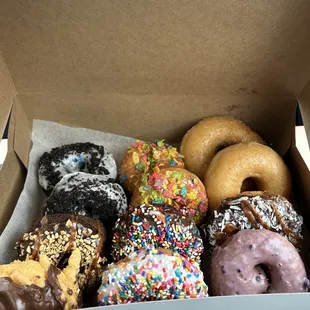 a variety of donuts in a box