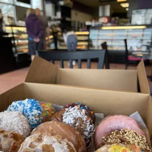a variety of donuts in a box