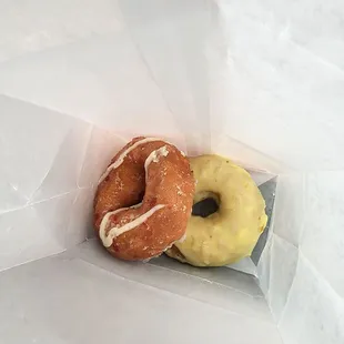 Strawberry cheesecake and lemon cake donuts