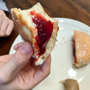Inside of jelly donut with raspberry filling