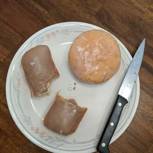 Maple bar donut with custard filling and jelly donut with raspberry filling