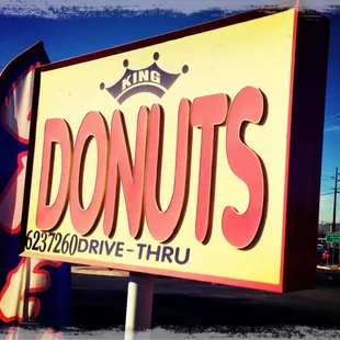 a sign for a donut shop