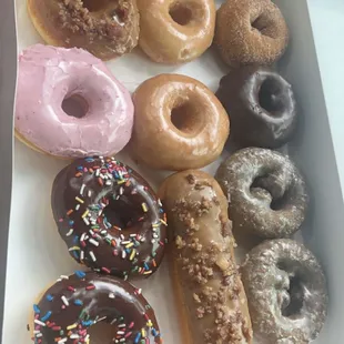 a variety of doughnuts in a box