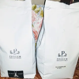 two bags of coffee on a counter