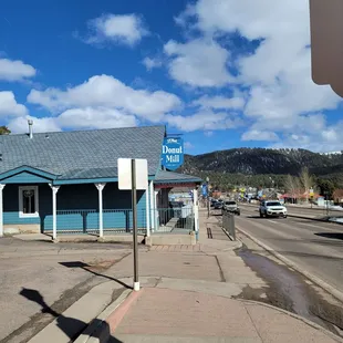 a blue building with a blue roof