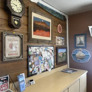 a wooden wall with a clock on it