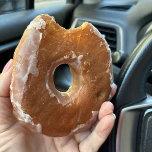 Halfway glazed glazed donut.