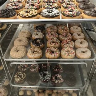 a variety of doughnuts on display